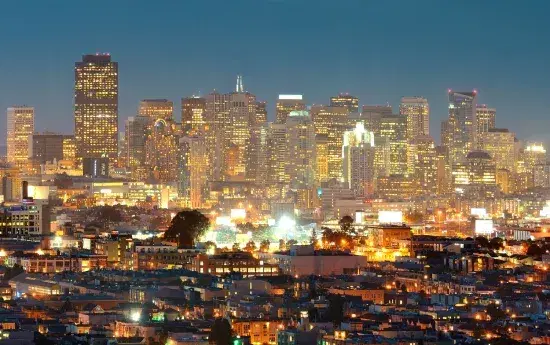City skyline at night representing Sohnne's global affiliate community