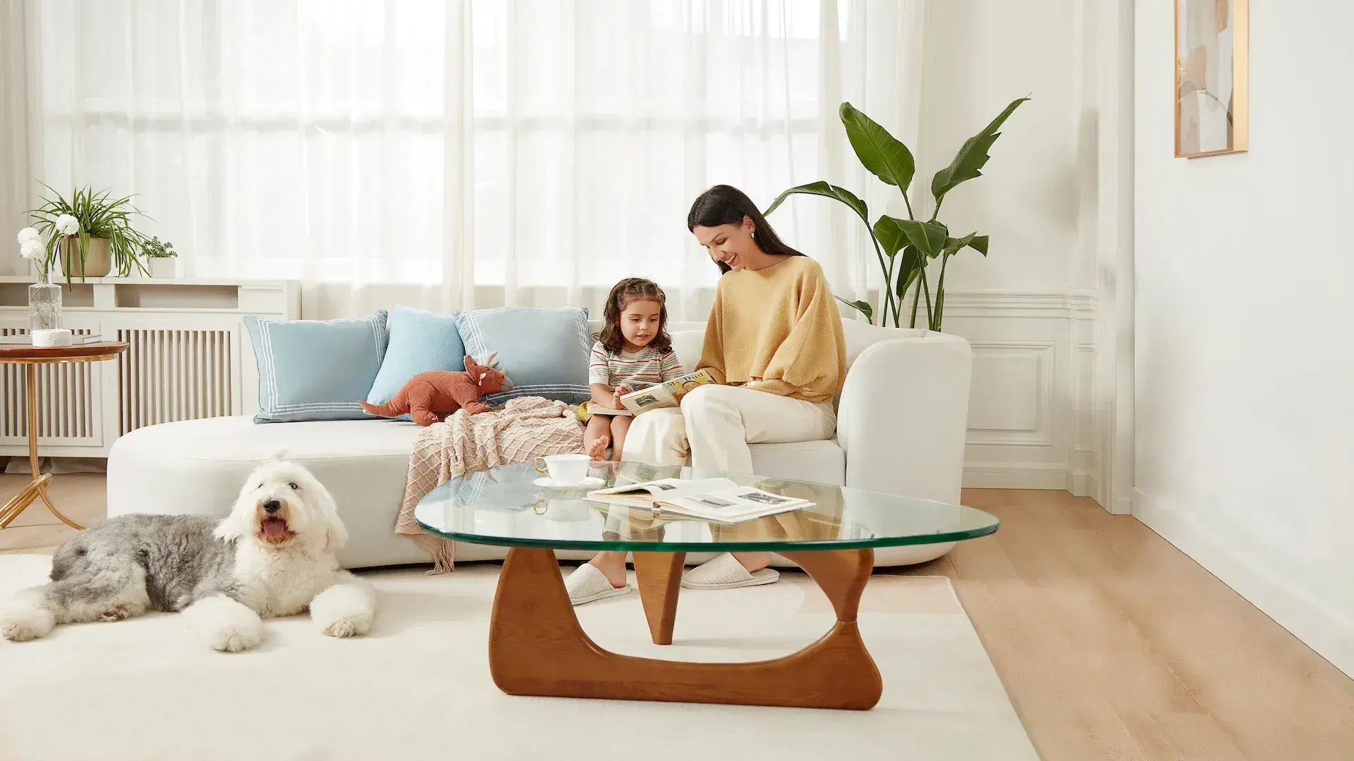 A cozy family moment in a bright living room featuring Sohnne furniture